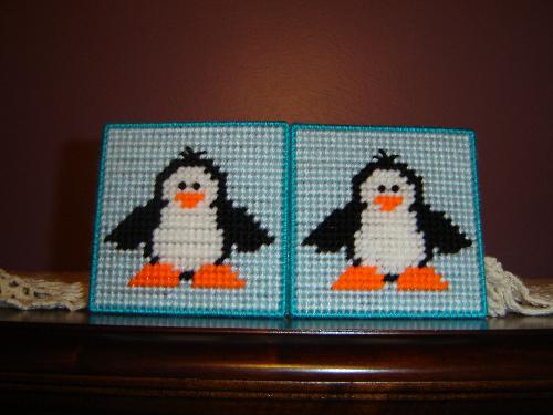 Penguin coasters - Penguin coasters made with yarn and plastic canvas