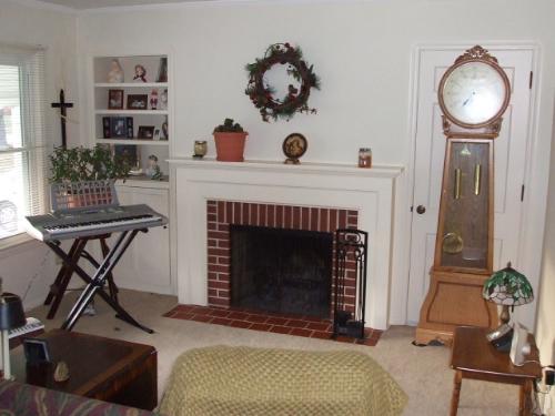 the north side of our living room - This is a picture of the north side of our living room. The keyboard that my husband is learning to play.