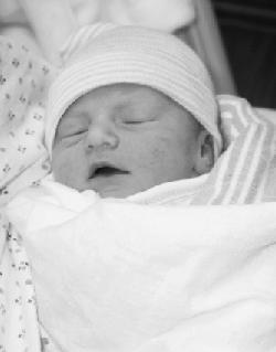 Emma Grace - I love this black and white shot, it hides the red marks that were on her face when she was born. The picture was taken minutes after she was born.