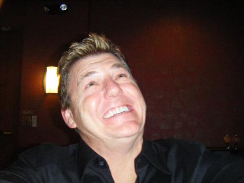 dad :) - my dad at benihanas trying to take a picture of himself because hes not in any  haha