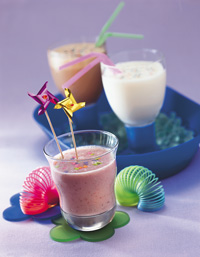 Sugar-free chocolate Milkshake - This is a photo of several glasses with choclate and vanilla milkshakes that are sugar free made drom sugar free ice cream. it is a delightful thing to have as a snack or dessert.