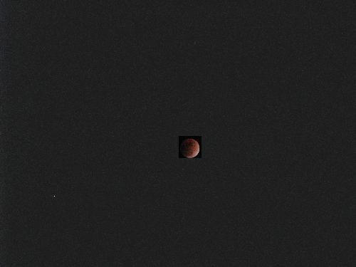 Lunar Eclipse - This was taken with a Canon powershot S5 with IS. I had it on a tripod and used a 2 second delay to reduct the shake of the camera. I used the program mode with an ISO of 400 and the 12x Optical zoom. 