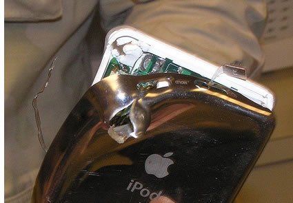 Broken Ipod - Ipod that looks like it was dropped.