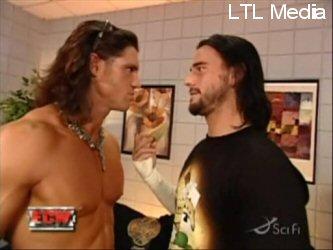 CM Punk and John Morrison - I just loved their rivalry when CM Punk was trying to win the title