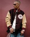 t.i - TI, wow, raps like wow. Slim, but his voice sounds like some big old dude, very strong and powerful T.i is one of my favorite rappers.