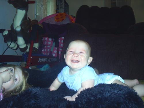 my son - my smiley little guy on a bear rug