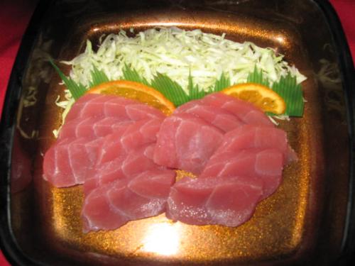 Tuna Sashimi - Raw tuna thinly sliced served with wasabi and soysauce