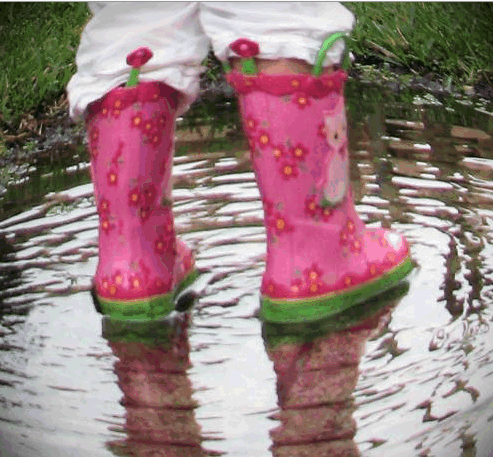 I love walking in puddles after it has rain - My granddaughter walking puddles after the rain