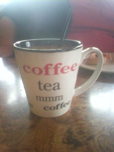 A Cup Of Coffee!!  - I thought this was a neat mug, when I saw it at a local cafe, here in Arizona, a few days ago. I just had to snap a picture.