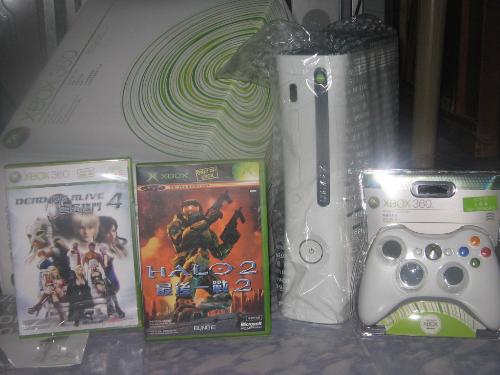 Xbox 360 Premium Pack - This is my 360 when I first got it last September. The experience was a blast so far!