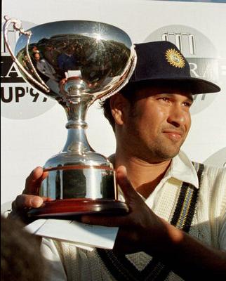 Sachin The legend - sachin tendulkar holding the trophy