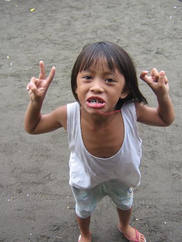 laughter in a childs eye - this photo capture a sincere smile of a child.