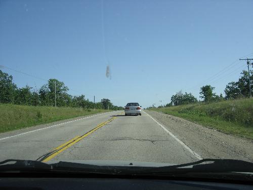 on the road - this pic was taken from inside the car. i don't remember where we were going, but i thought it would be fun to take a picture of the road ahead. i think i have a few pics like that...