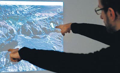 Computing with gestures -  A man stands in front of a large screen, gesticulating in a hectic manner. As if by magic, images suddenly appear on the display. Their movements follow the actor’s gestures, rotate at the slightest turn of a finger, and become larger or smaller as desired. This scene will look familiar to anyone who has watched the sci-fi film Minority Report. Now, this new system promises to turn it into reality.