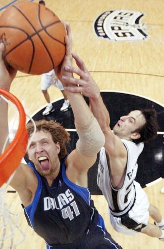 Dirk puts it in over Manu in one of the most histo - Dirk drives past Bowen, takes it up strong and finishes as Manu Ginobli comes over to foul him and allows Dirk to tie it up at the free throw line where the Mavs eventually finish this team off on their homefloor in game 7 in OT. Possibly the greatest moment in Mavericks history EVER!
