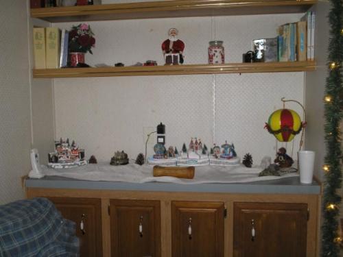 Holiday Village  - This is the first half of my village scene on one side of fire place. christmas 05