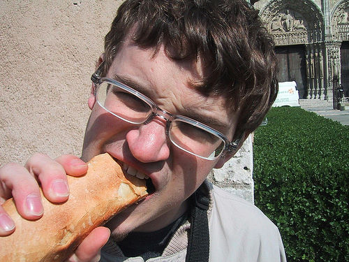 Do you munch your food slowly or gobble everything - A picture of a guy eating. Photo source: http://farm1.static.flickr.com/10/20646641_4e17082864.jpg?v=0 .