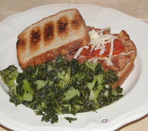 Homemade Bean Burger w/ Greens - Kidney Beans, Chick Peas, onion, mushroom mashed together with a bit of Olive oil. Form into patties and cook on oiled griddle for 5 min each side. Place on toasted whole grain bread and top with salsa and cheese and a tsp of sour cream.   Greens, broccoli and spinach steamed together.