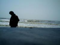 he's me - standing on the sand in a beach in Karawang