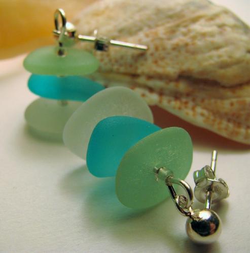 Sea Breeze Sea Glass Earrings - The sea, surf and wind took these discarded pieces of glass and created 6 rounded, smooth gems. Seafoam green, aqua blue and a frosty clear piece of sea glass adorn these post-style sterling silver earrings. Available at Etsy.com