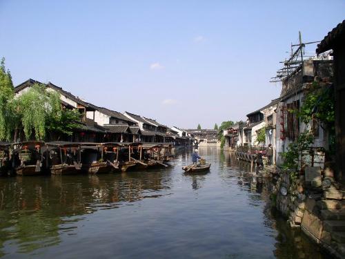 a peace town called Xitang lies in zhejiang provin - a peace town called Xitang in zhejiang province near shanghai. many visitors come here each year.