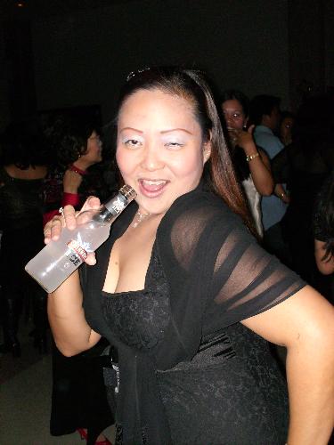 Christmas Party 2007 - I finished hosting our annual Filipino Canadian Christmas party... I'm not really a drinker... that's just props for picture taking.... hahaha....
