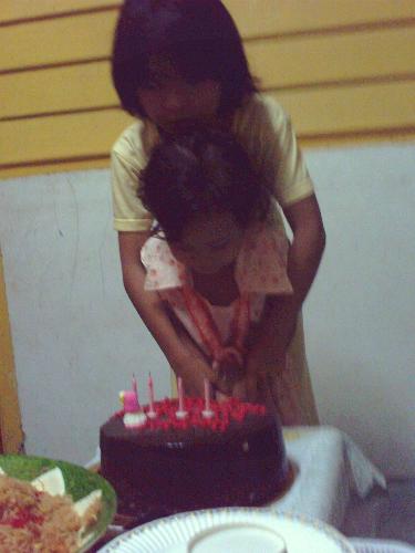birthday celebration - this is the way i celebrate my youngest birthday. She is vary happy because she got a big cake. The important thing is we love her vary much..