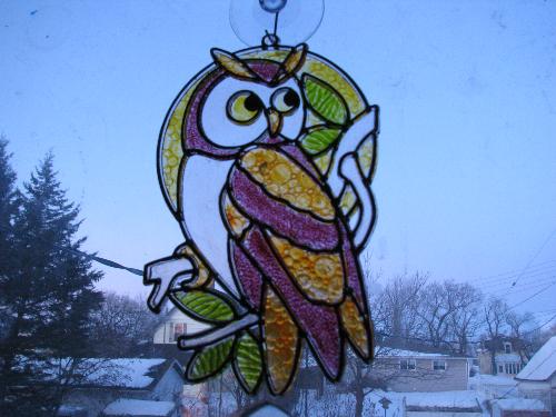 Stained glass owl - This owl hangs in my office window...just one of many owl collectibles I have.