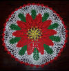 Crochet poinsettia doily especially for Christmas - I love doing crochet and so does my mother. Here you see a picture of my poinsettia doily I made in crochet. You can use it to adorn your house or give away as a gift.  Check out my site : http://jolincreations.webs.io for more.
