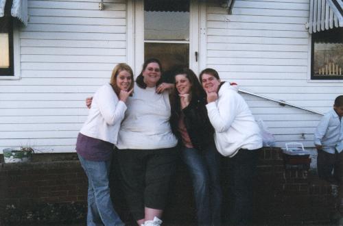 My sisters - oh ..and me, in the black. - Coincidentally, all four of us pose the same way all the time.. and we didn't even know our pic was being being taken!!:-O