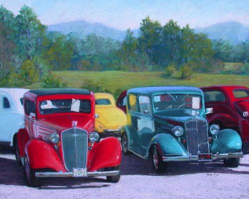 Old car - An old cars with eye catching color of red, yellow, gray and white.