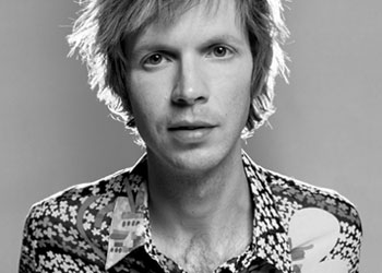 Beck - B&W ECU of Beck wearing a collared shirt