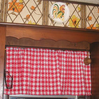table cloth turned valance - this is a picture of daughter's first sewing project. I brightens up an otherwise drab area.