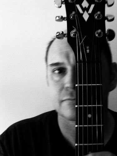 behind headstock - same