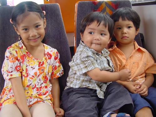 My 3 kids inside the bus - They love the camera and enjoys every attention given them.