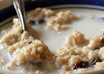 Oatmeal and Raisins - This is a photo that I took of a bowl of oatmeal with some raisins.