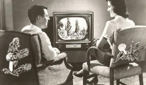 TV Back In The Old Days - A couple sitting and watching TV together...