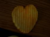 potato chips - this is a Ruffles Potato chip that is shaped like a heart. What a find! I should post it for auction on ebay. LOL