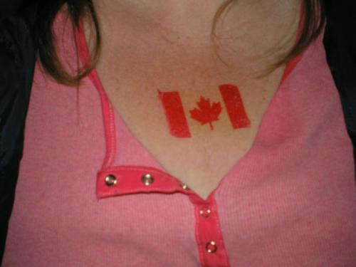 Canada Gal's Chest - Canadian flag tattoo on a Canadian Gal's chest