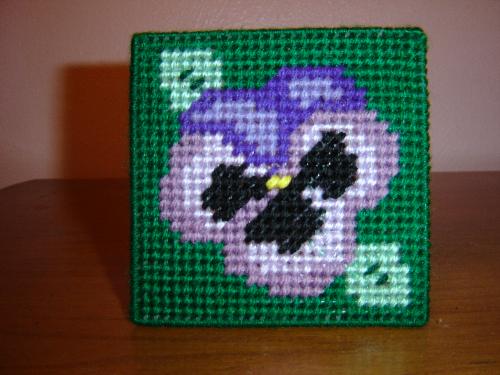 Pansy Coasters - Pansy coasters made with plastic canvas. These are washable.