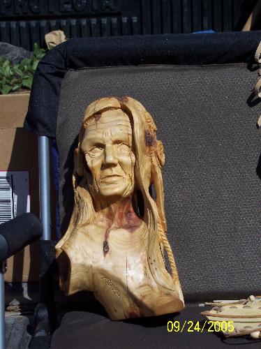 Talon - Made out of a Juniper crotch.  this is what husband does with his spare time. or on commission.