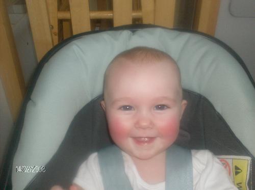 My baby girl! - This is my beautiful baby girl when she had a fever. Her cheeks were bright red and despite being quite poorly she still had a giggle for her mummy and the camera!