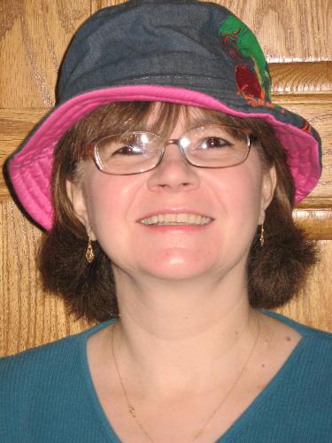 Me with one of my many hats on - I love to wear hats. This is just a cheap Fun hat.