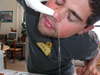 Guy using a neti pot - looks like fun