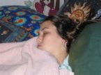 A girl sleeping in the with a wet hair - A girl sleeping in the bed with a wet hair
