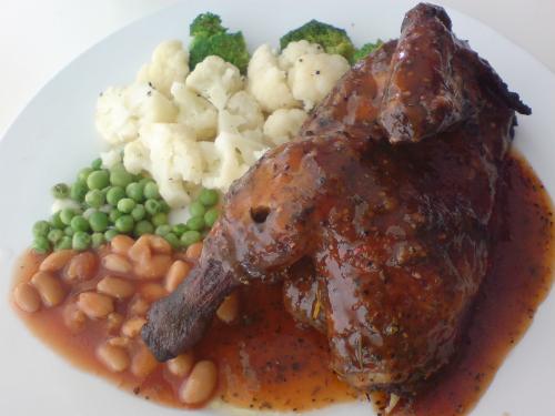 half roasted chicken - It's enough for two person actually~ Black pepper roasted chicken with sauce.. Boiled vegetable, baked beans as sides.