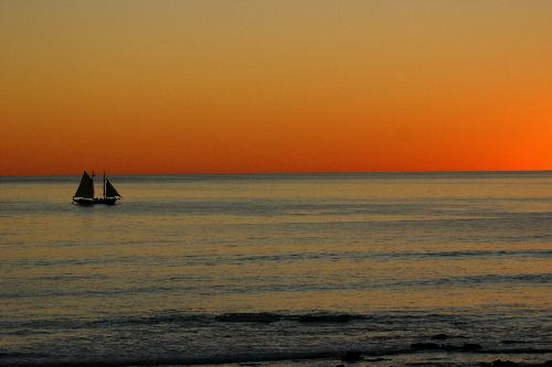 Sunset - Photo taken in Broome West Australia the boot in the picture is a old Pearl logger.