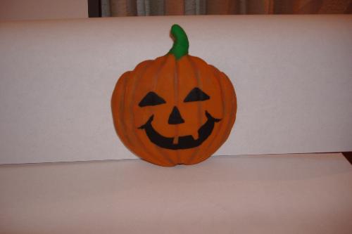 My Halloween Polymer Clay Sculpture - I had fun making this clay sculpture. I try to do one for each holiday and occassion. I'm not trying to do older men and women and looking for inspiration for their settings.