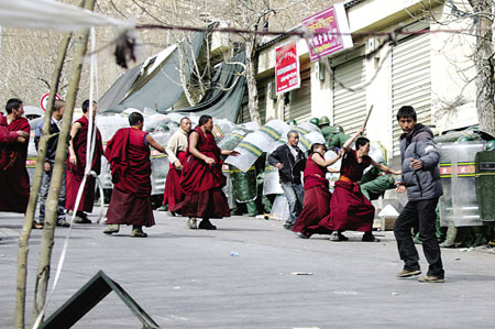 violence in Tibet - some of Monks were attacting the Riot police.