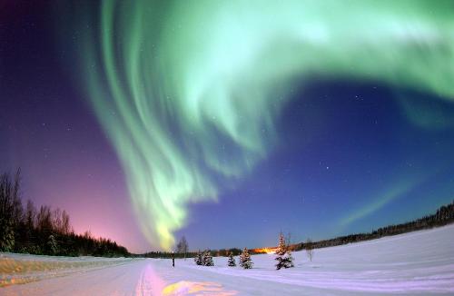 Aurora - In northern latitudes, it is known as the aurora borealis (or the northern lights), named after the Roman goddess of dawn, Aurora, and the Greek name for north wind, Boreas. It often appears as a greenish glow or sometimes a faint red, as if the sun was rising from an unusual direction.